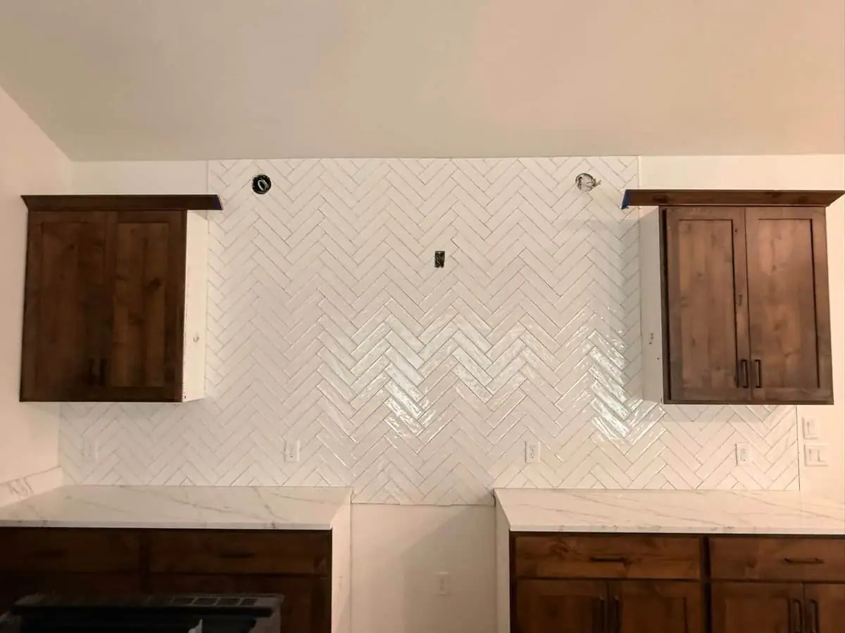 White herringbone backsplash