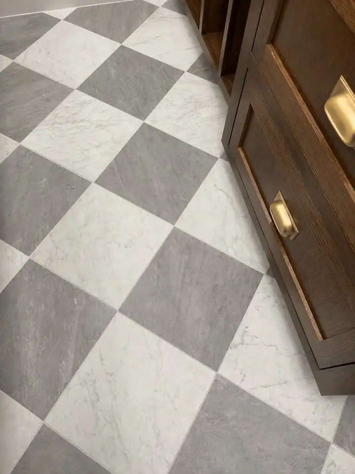 Marble checkerboard floor beside a walnut vanity