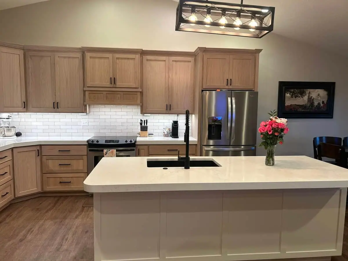 Kitchen island topped with white quartz