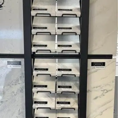 Quartz countertop sample boards fanned out on display